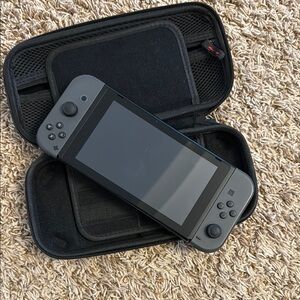 Used -Nintendo Switch Console - Gray

Console and Case Only